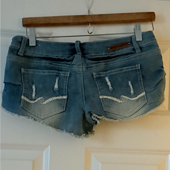 Almost Famous Distressed Blue Denim Shorts with Striped Pocket Trim - Picture 4 of 5